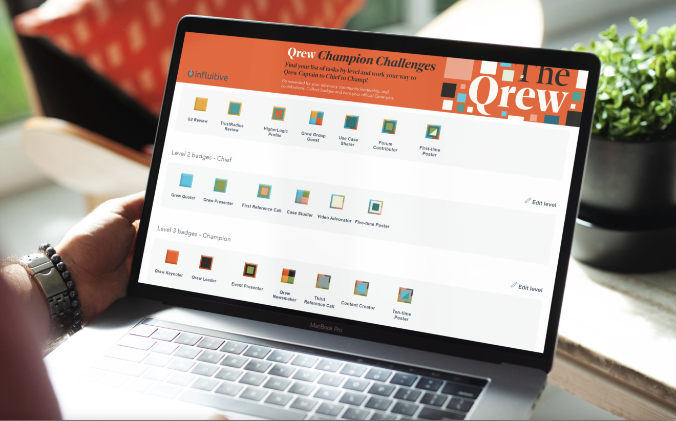 A laptop screen, displaying the various available Qrew Champion badges