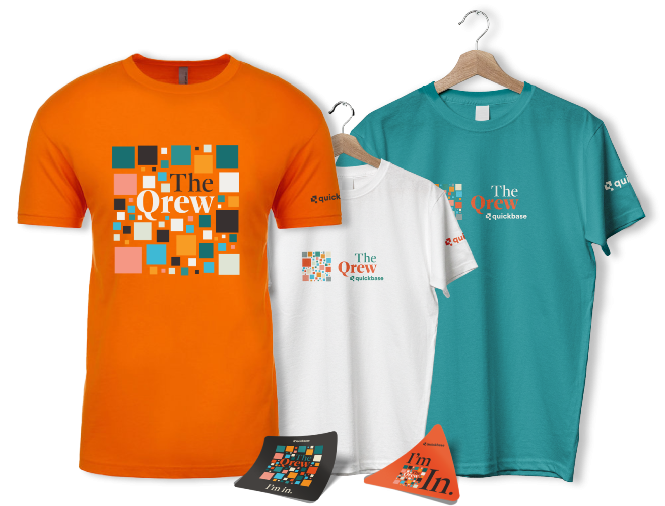 Examples of Qrew co-op swag, including three t-shirts and two pennants.